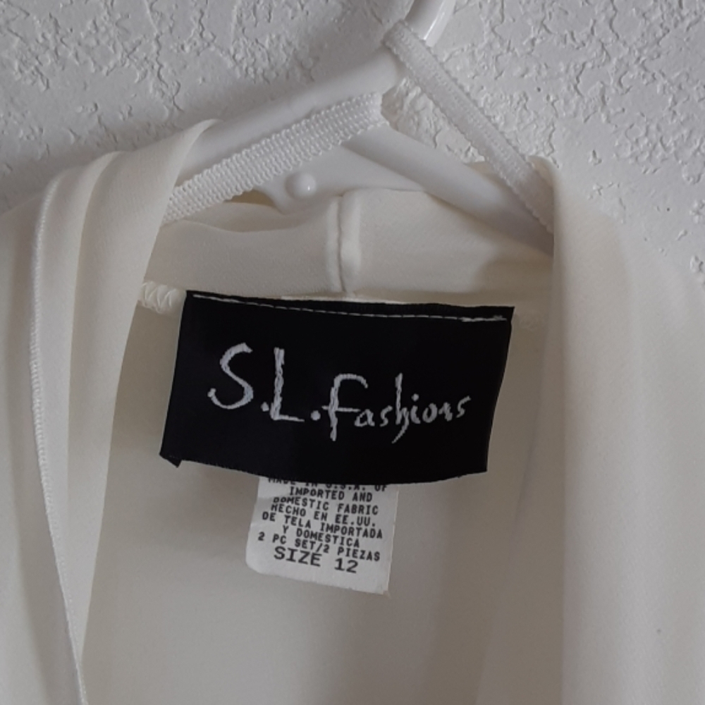 Cream colored beaded chiffon dress